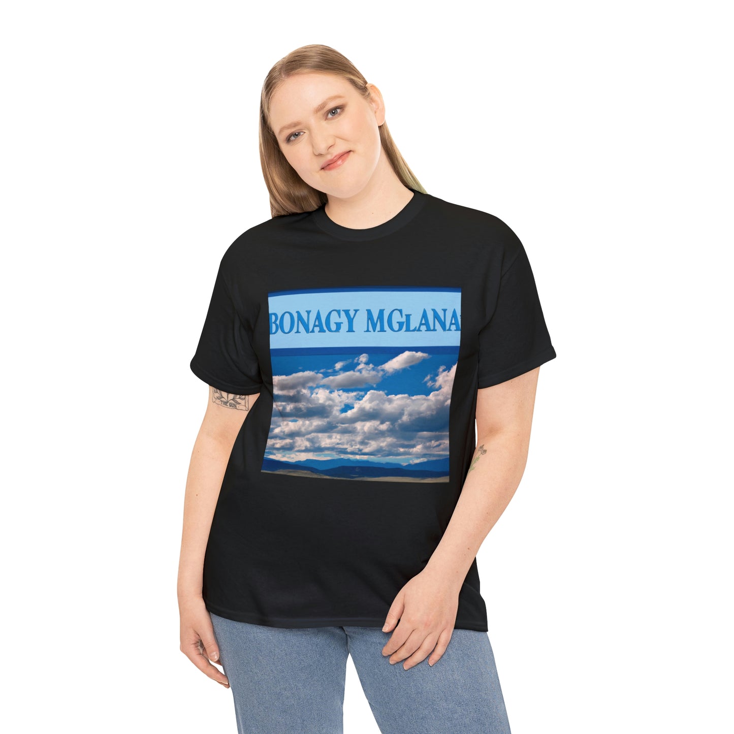 Big Sky Country is a term used to describe the mountainous landscape of the US state of Montana, known for its vast, unspoiled beauty where, on crystal-clear blue-sky days, it feels like you can see forever. - T-shirt