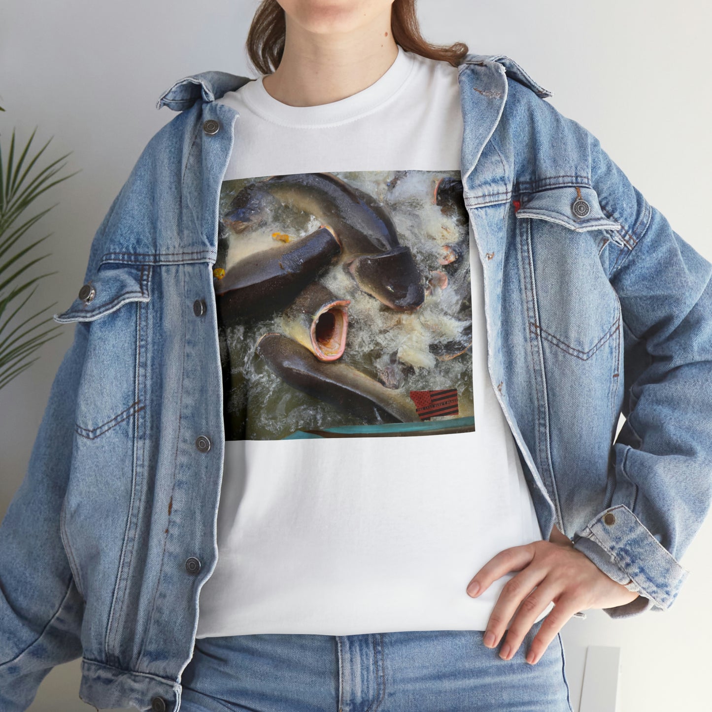 The Galactic Fighter Fish. This unique breed has two amphibious, glowing, neon blue horns that light up the dark, starry depths of the ocean. When provoked, this breed of fish is aggressive and will swim in circles at lightning speed - Tshirt