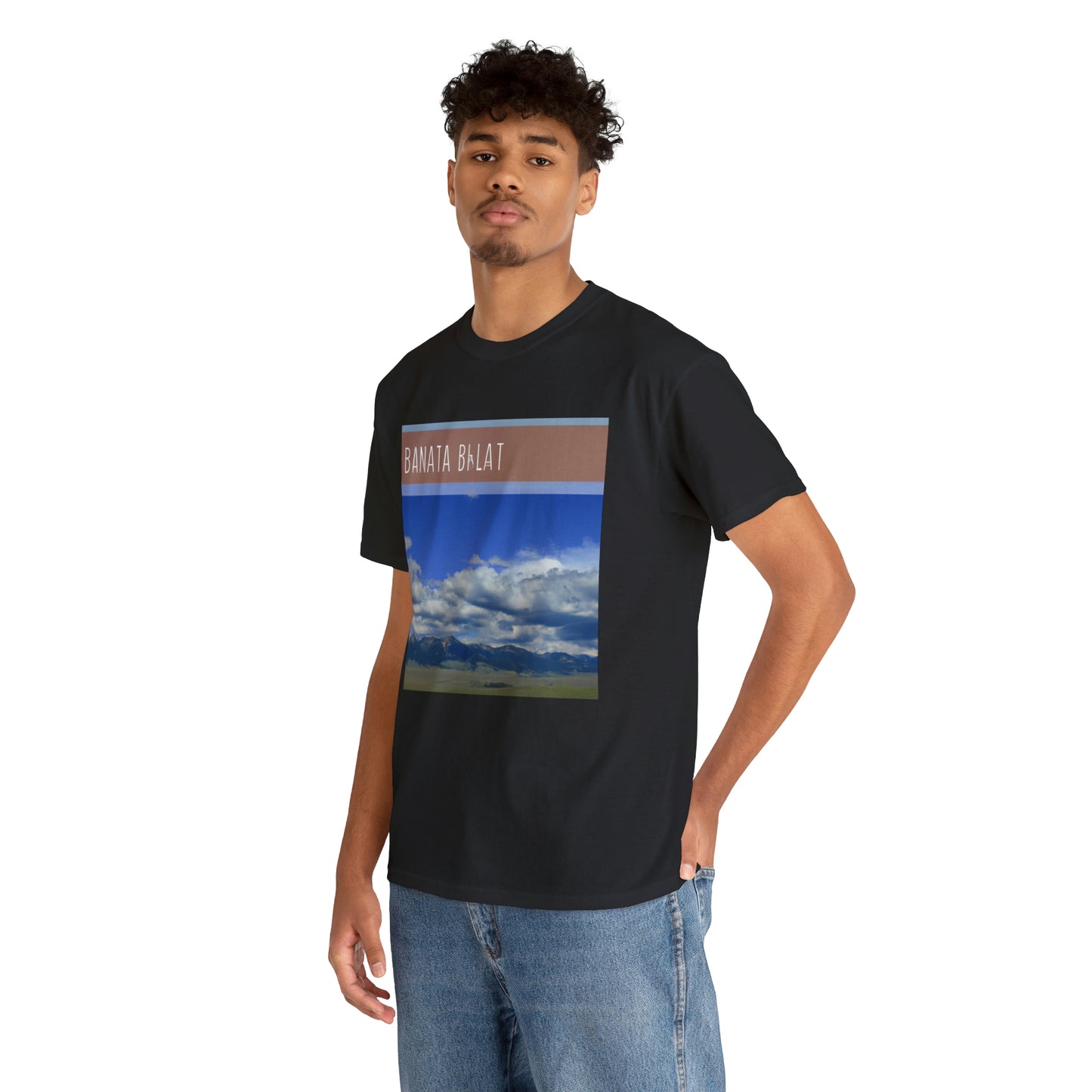 Big Sky Country is a colloquial term used to refer to the western part of the United States. This region is characterized by wide open plains and majestic mountains with pristine wilderness. It is often used to refer to the states of Montana, - T-shirt