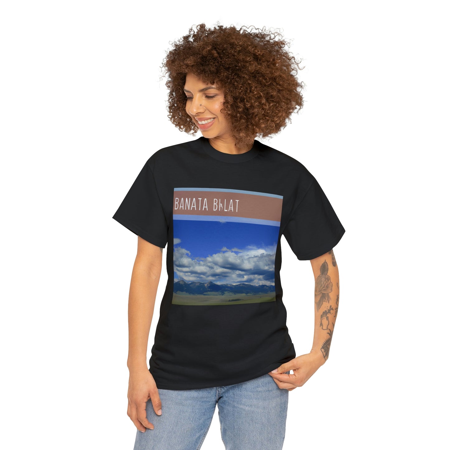 Big Sky Country is a colloquial term used to refer to the western part of the United States. This region is characterized by wide open plains and majestic mountains with pristine wilderness. It is often used to refer to the states of Montana, - T-shirt