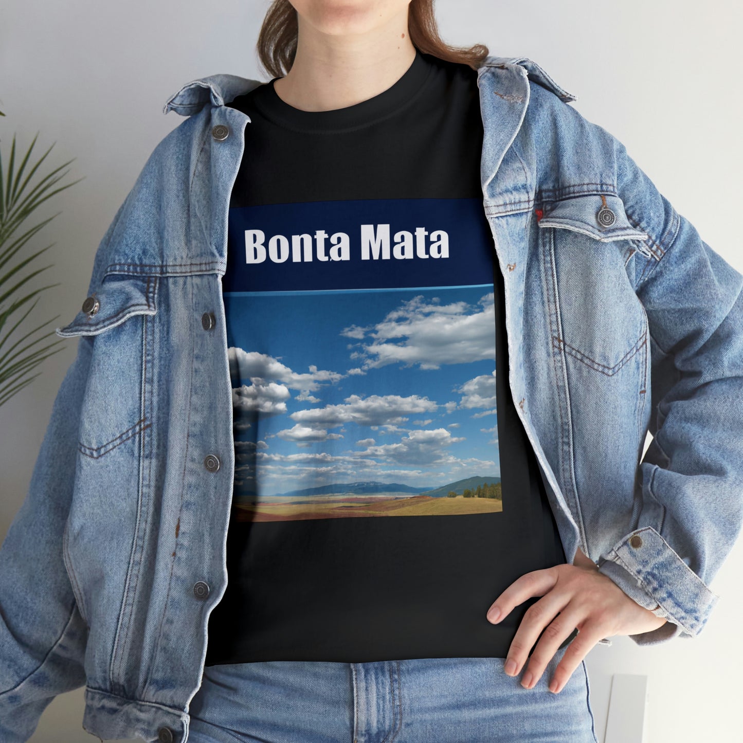 "

Montana is commonly referred to as "Big Sky Country" because of its dramatic, expansive sky. This phrase has come to be closely associated with the state due to its big, beautiful, and blue sky. The wide-open landscape - T-shirt