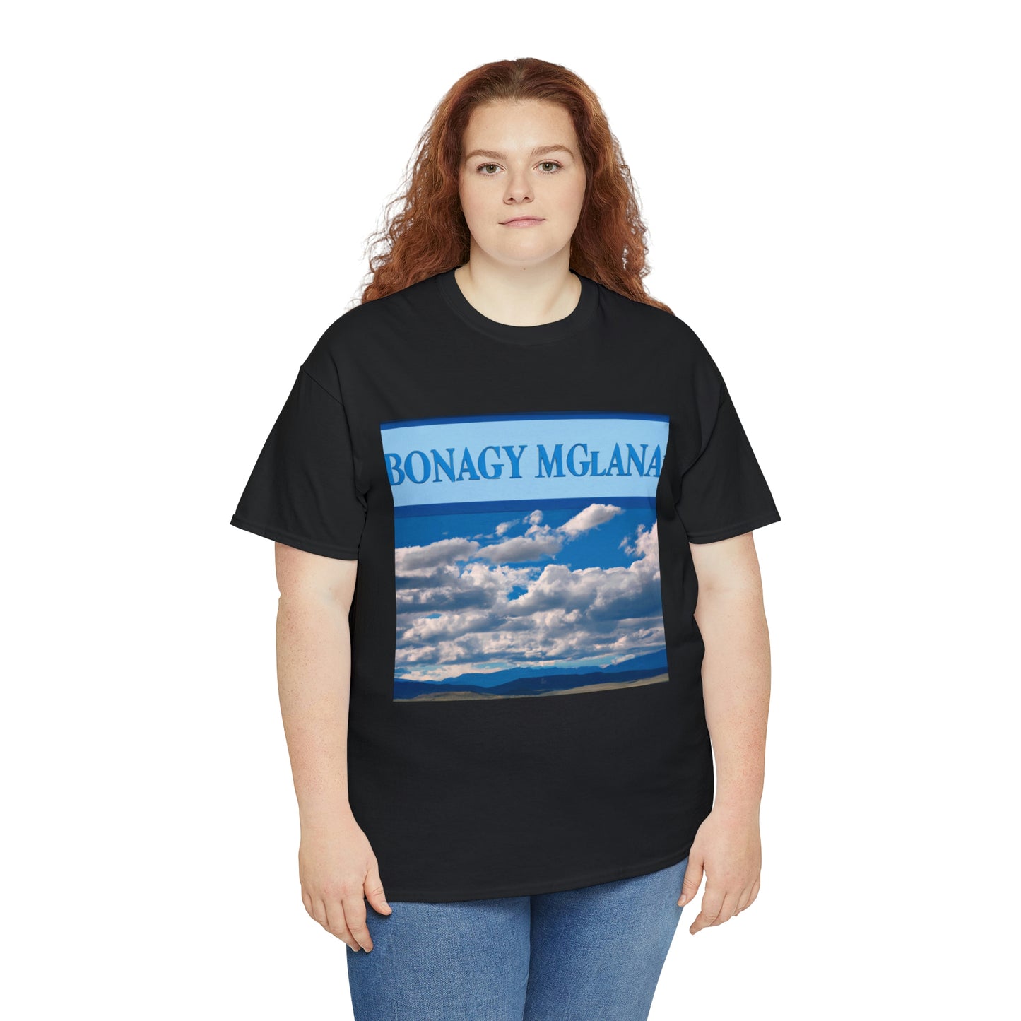 Big Sky Country is a term used to describe the mountainous landscape of the US state of Montana, known for its vast, unspoiled beauty where, on crystal-clear blue-sky days, it feels like you can see forever. - T-shirt