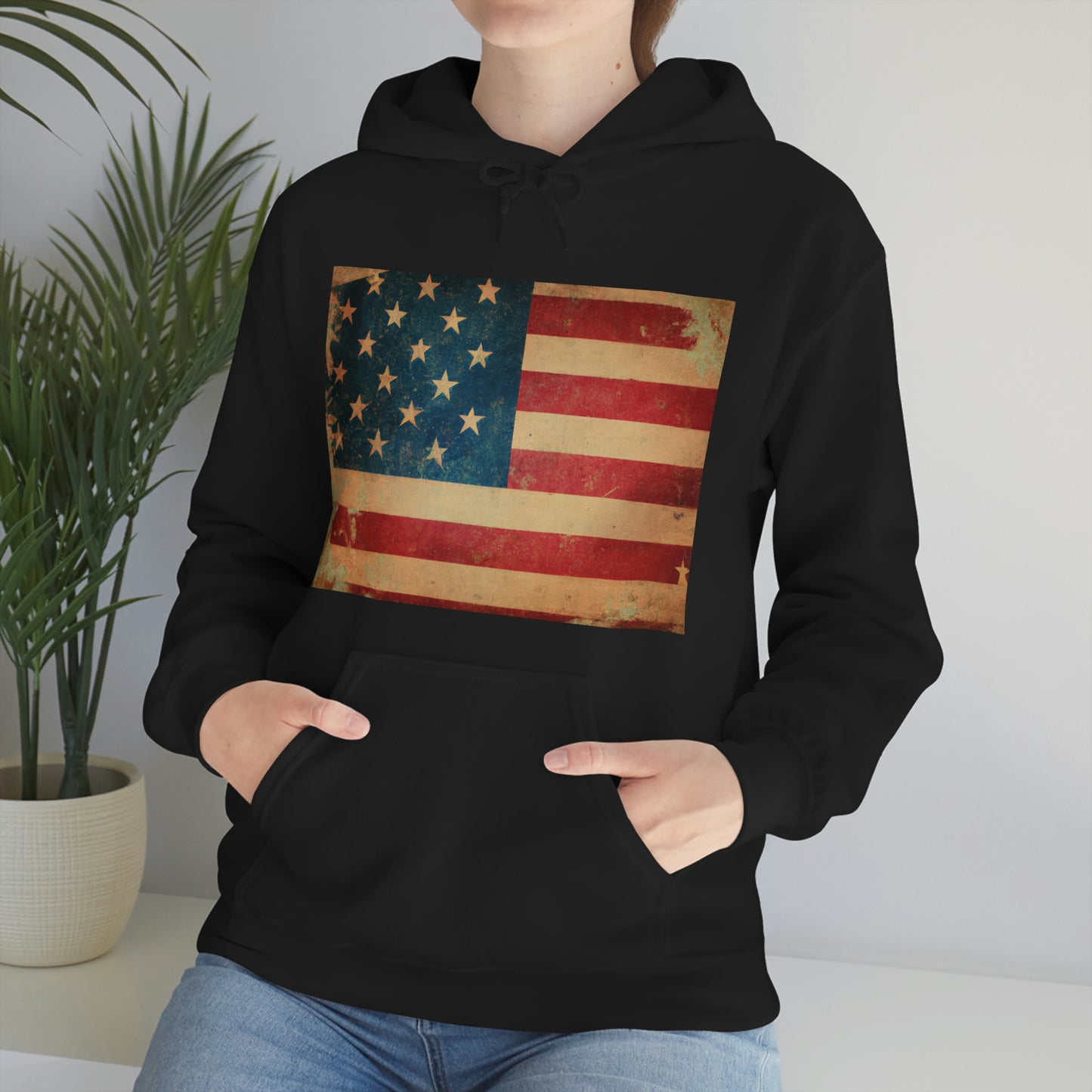 "Our country was founded on a bedrock principle that we are all created equal. The American flag stands for our national motto: 'Out of Many, One.' It flew over an America that was divided - black and white, rich and poor - Hoodie