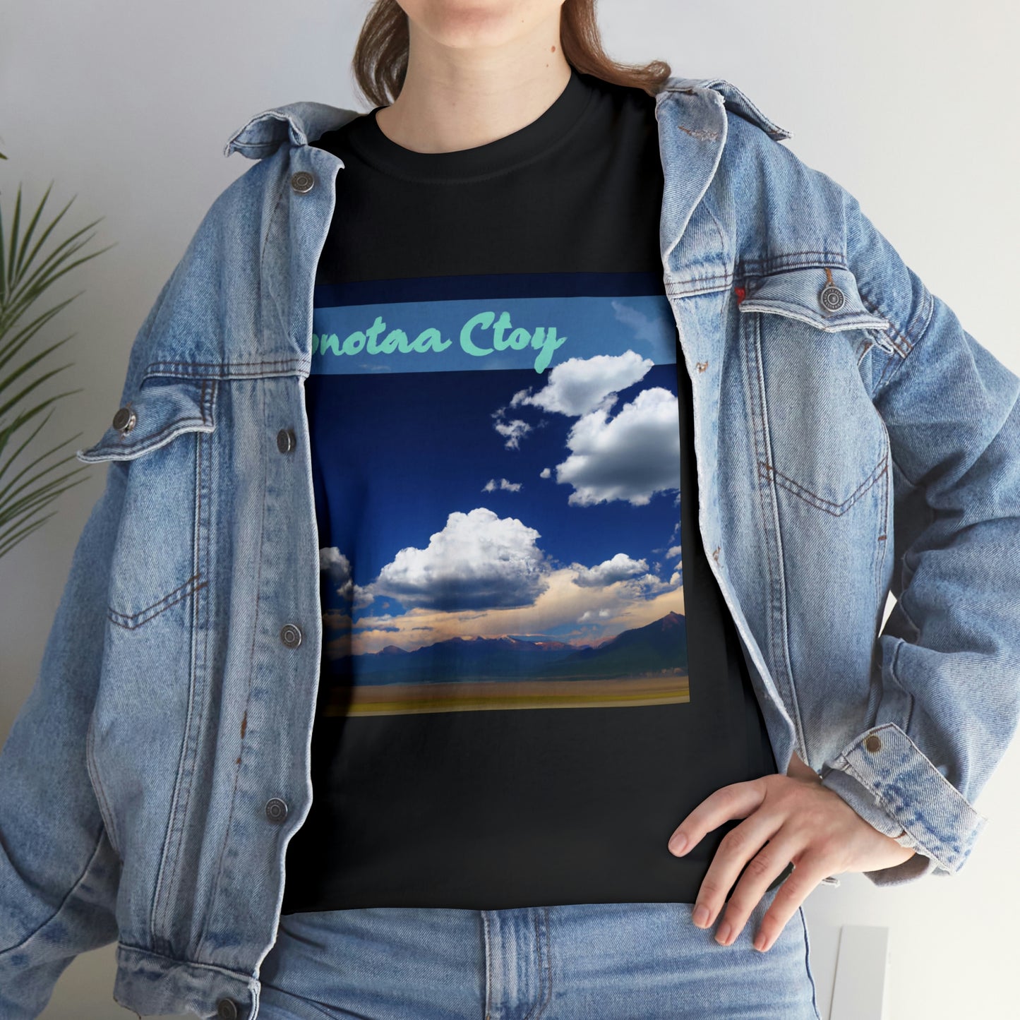 Big Sky Country is the nickname for the state of Montana in the United States. The nickname comes from the phrase, “Big Sky Country,” which was first used in the novel, Wolf Willow, by A.B. Guth - T-shirt