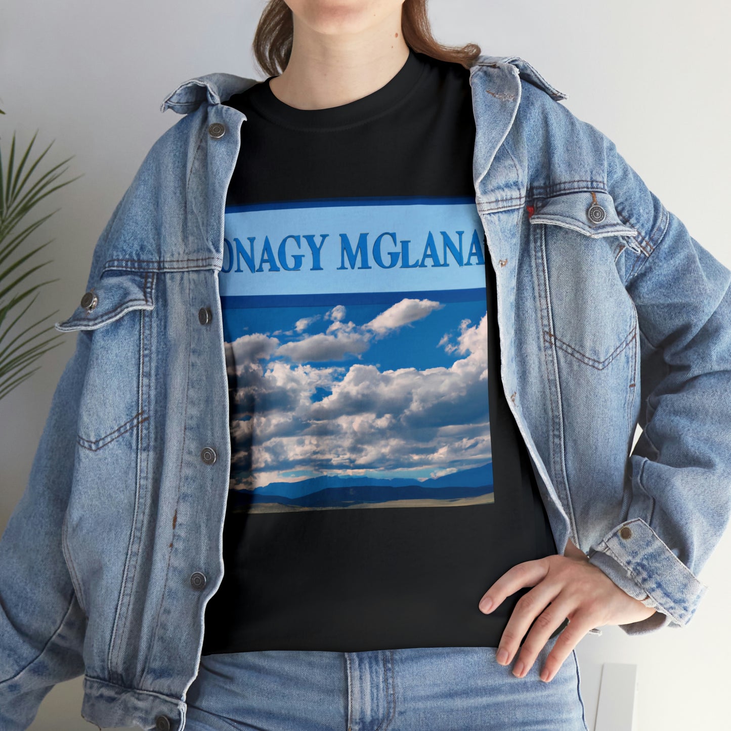 Big Sky Country is a term used to describe the mountainous landscape of the US state of Montana, known for its vast, unspoiled beauty where, on crystal-clear blue-sky days, it feels like you can see forever. - T-shirt