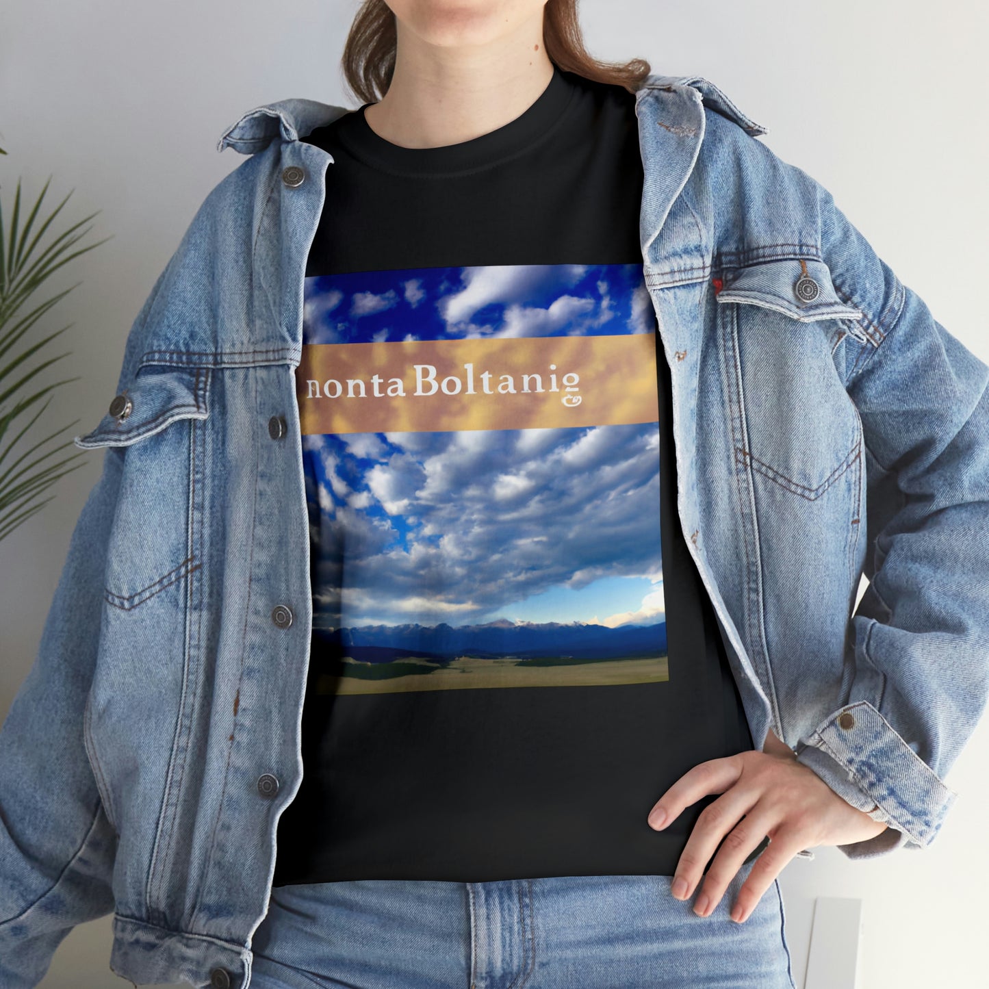 Big Sky Country is a nickname given to the US state of Montana. It is derived from the state's wide open spaces and views of its dramatic landscape. Montana is known for its majestic mountains, expansive plains, glimmering lakes and rivers - T-shirt